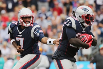 FOXBORO, MA - SEPTEMBER 18:  Jacoby Brissett #7 of the New England Patriots hands off the ball to LeGarrette Blount #29 during the second half against the Miami Dolphins at Gillette Stadium on September 18, 2016 in Foxboro, Massachusetts.  (Photo by Jim R