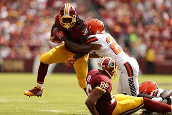LANDOVER, MD - OCTOBER 2: Running back Matt Jones #31 of the Washington Redskins is tackled by cornerback Jamar Taylor #21 of the Cleveland Browns in the first quarter at FedExField on October 2, 2016 in Landover, Maryland. (Photo by Patrick Smith/Getty I