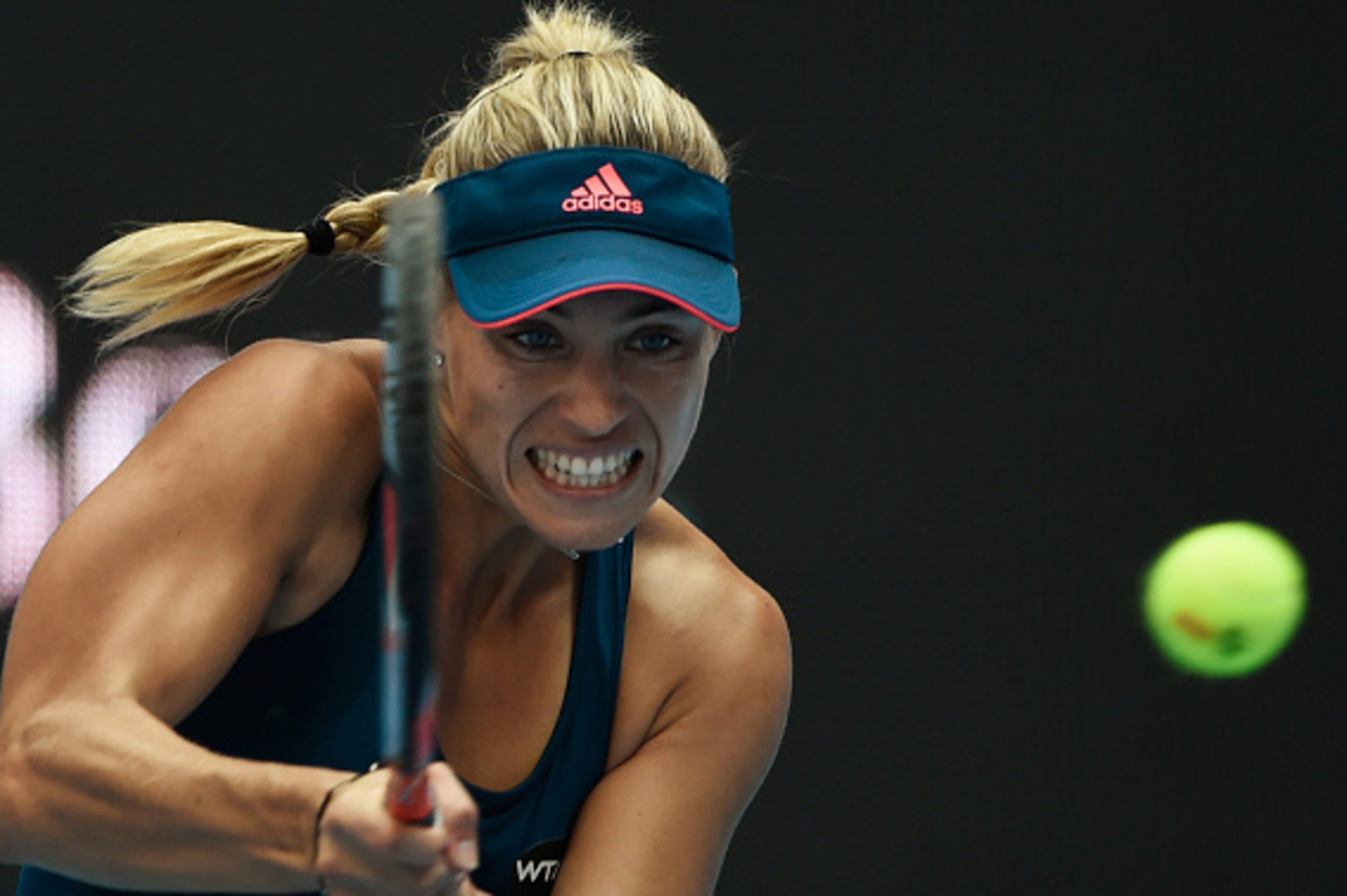 Angelique Kerber of Germany hits a return against Katerina Siniakova of the Czech Republic during their women's singles first round match at the China Open tennis tournament in Beijing on October 3, 2016. / AFP / FRED DUFOUR        (Photo credit should re