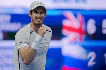 Andy Murray of Britain celebrates winning 6-2 6-1 over Andrey Kuznetsov of Russia during the men's single second round of the China Open tennis tournament in Beijing on October 5, 2016. / AFP / NICOLAS ASFOURI        (Photo credit should read NICOLAS ASFO