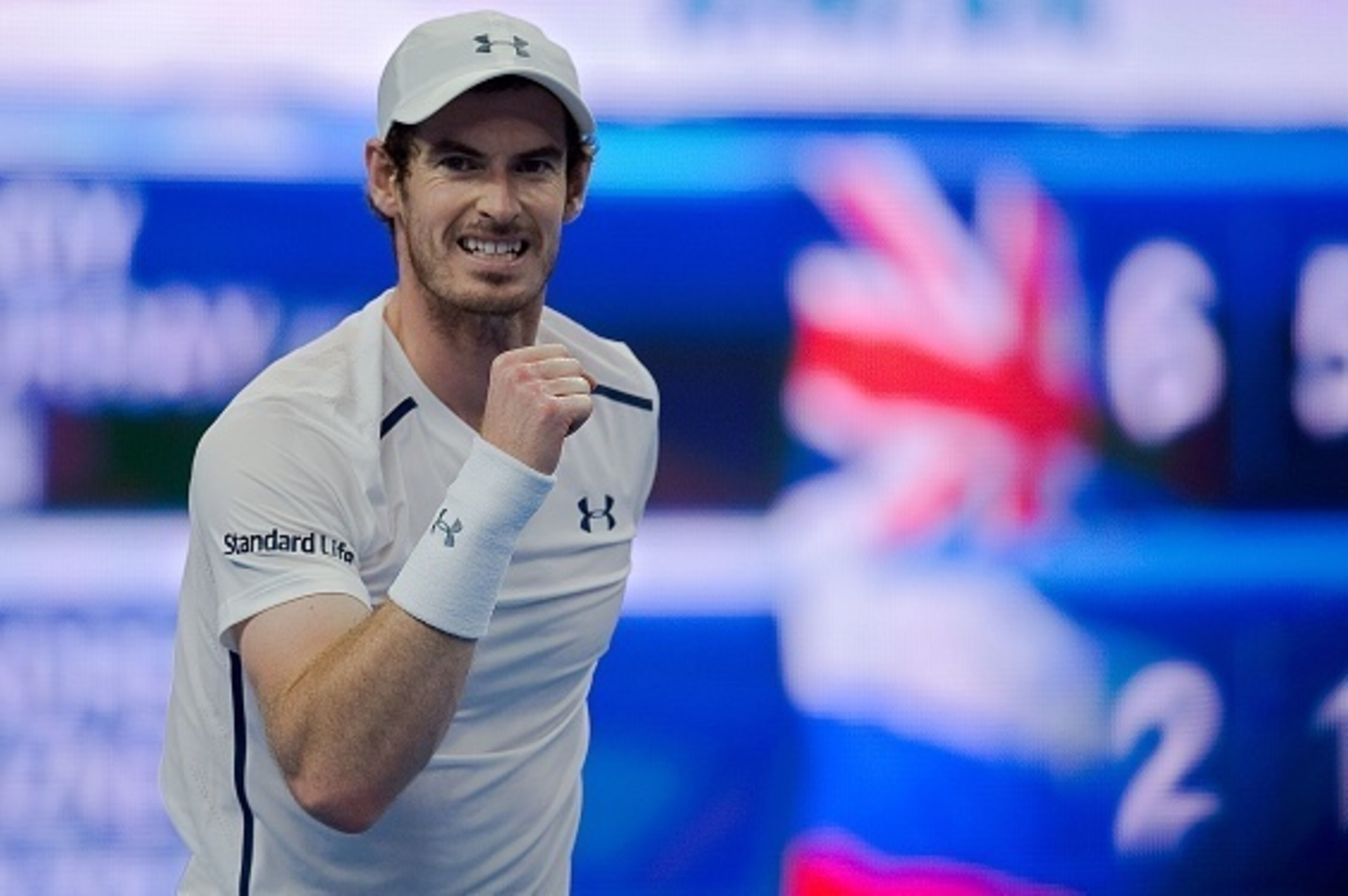 Andy Murray of Britain celebrates winning 6-2 6-1 over Andrey Kuznetsov of Russia during the men's single second round of the China Open tennis tournament in Beijing on October 5, 2016. / AFP / NICOLAS ASFOURI        (Photo credit should read NICOLAS ASFO