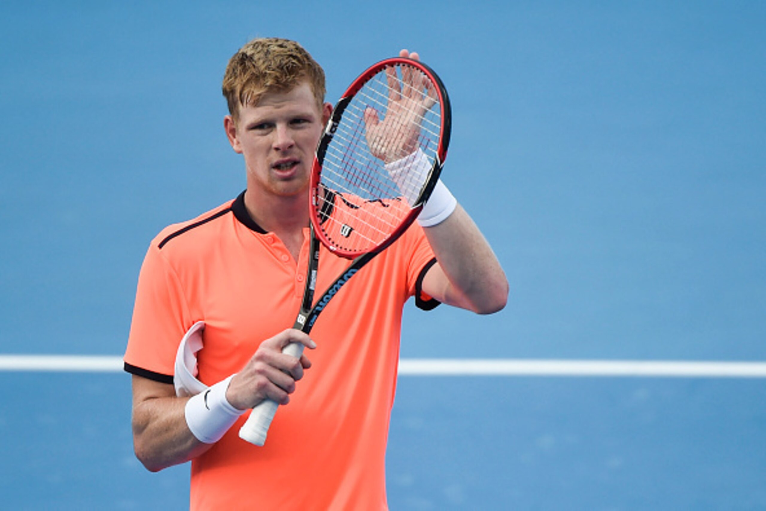Kyle Edmund of Britain reacts after he defeated Roberto Bautista Agut of Spain during their men's singles first round match at the China Open tennis tournament in Beijing on October 5, 2016.  / AFP / FRED DUFOUR        (Photo credit should read FRED DUFOU