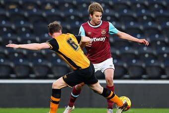 HULL, ENGLAND - MAY 04:  Ben Clappison of Hull tackles Martin Samuelsen of West Ham during the Second Leg of the Premier League U21 Cup Final at the KC Stadium on May 04, 2016 in Hull, England.  (Photo by Matthew Lewis/Getty Images)