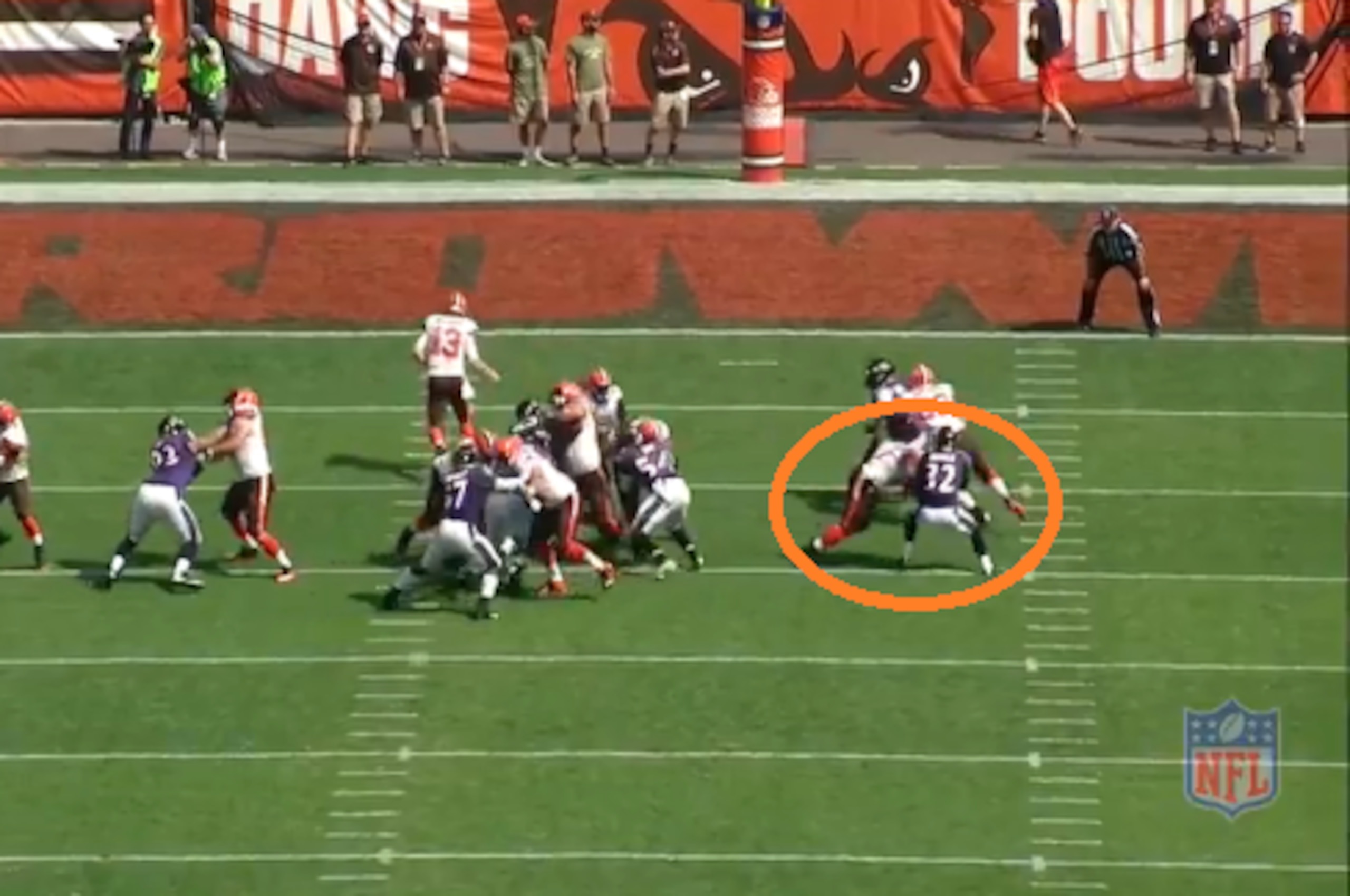 Cleveland Browns fullback Malcolm Johnson blocks Baltimore Ravens safety Eric Weddle.