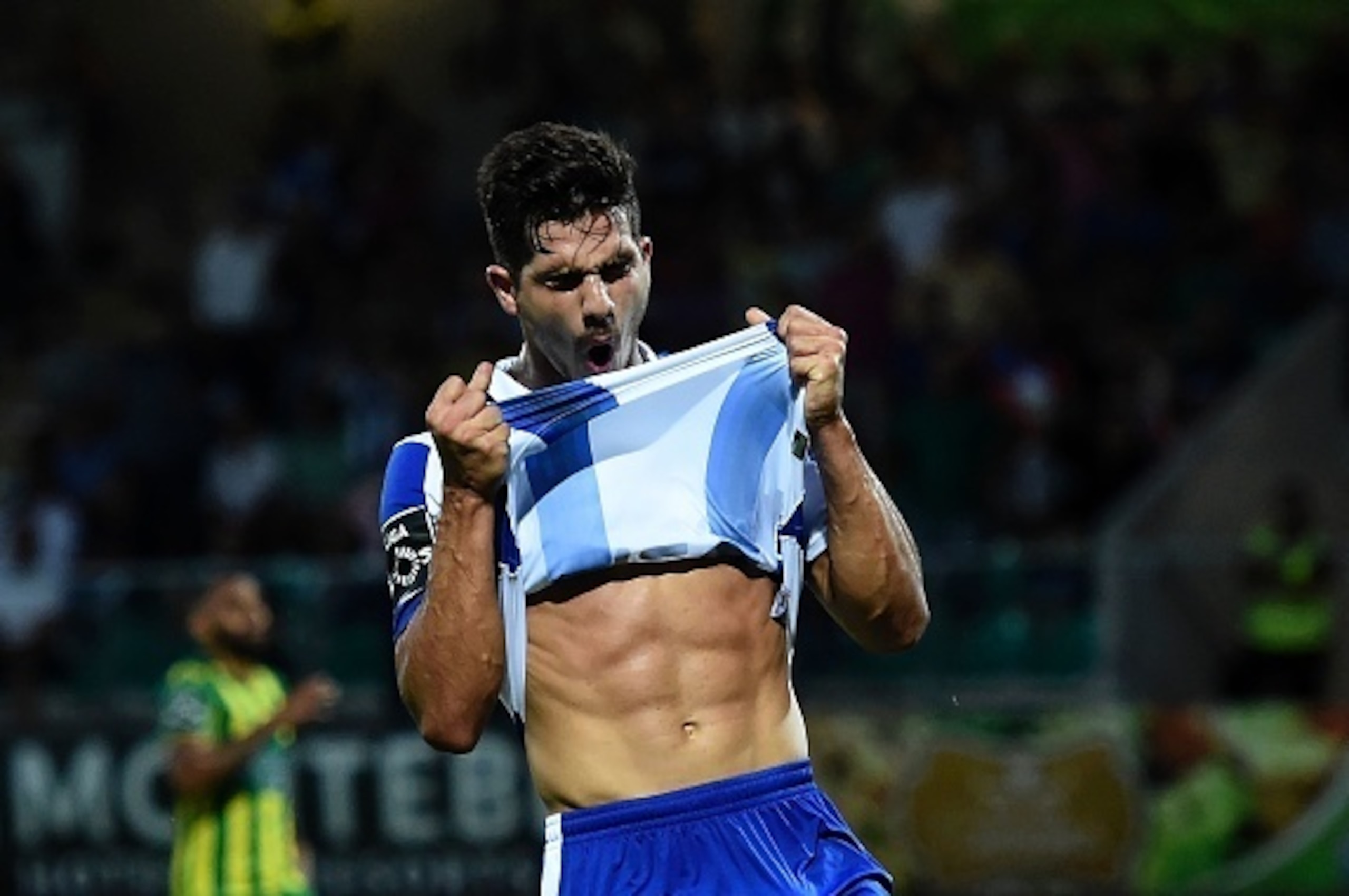 Porto's forward Andre Silva reacts after missing an opportunity to score during the Portuguese league football match CD Tondela vs Porto FC at the Joao Cardoso stadium in Tondela on September 18, 2016. / AFP / FRANCISCO LEONG        (Photo credit should r