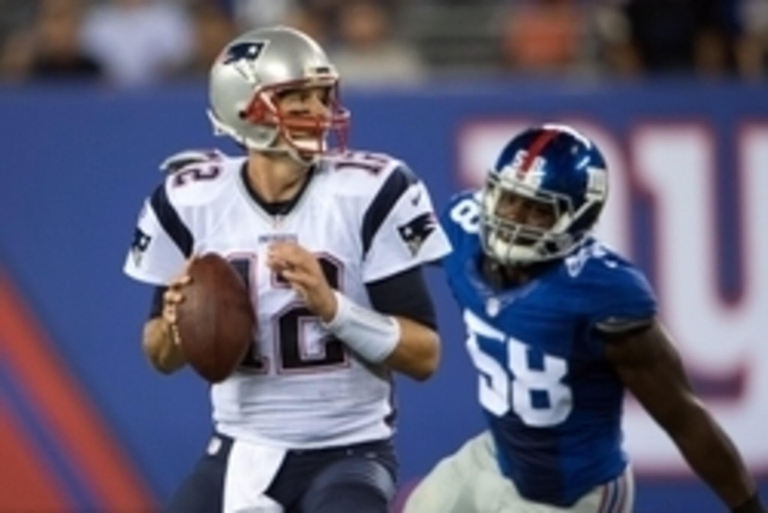 Sep 1, 2016; East Rutherford, NJ, USA;New York Giants defensive end Owa Odighizuwa (58) chasing down New England Patriots quarterback Tom Brady (12) in the first half at MetLife Stadium. Mandatory Credit: William Hauser-USA TODAY Sports Sep 1, 2016; East Rutherford, NJ, USA;New York Giants defensive end Owa Odighizuwa (58) chasing down New England Patriots quarterback Tom Brady (12) in the first half at MetLife Stadium. Mandatory Credit: William Hauser-USA TODAY Sports