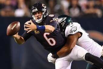 CHICAGO, IL - SEPTEMBER 19:  Quarterback  Jay Cutler #6 of the Chicago Bears fumbles the football against  Destiny Vaeao #97 of the Philadelphia Eagles in the second half at Soldier Field on September 19, 2016 in Chicago, Illinois.  (Photo by Stacy Revere