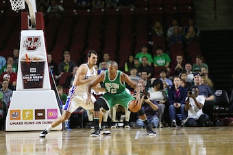 AMHERST, MA - OCTOBER 4:  Al Horford #42 of the Boston Celtics posts up against Dario Saric #9 of the Philadelphia 76ers during a preseason game on October 4, 2016 at the Mullins Center in Amherst, Massachusetts.  NOTE TO USER: User expressly acknowledges