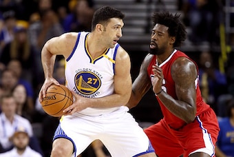 OAKLAND, CA - OCTOBER 04:  Zaza Pachulia #27 of the Golden State Warriors is guarded by DeAndre Jordan #6 of the Los Angeles Clippers during their preseason game at ORACLE Arena on October 4, 2016 in Oakland, California.  NOTE TO USER: User expressly ackn