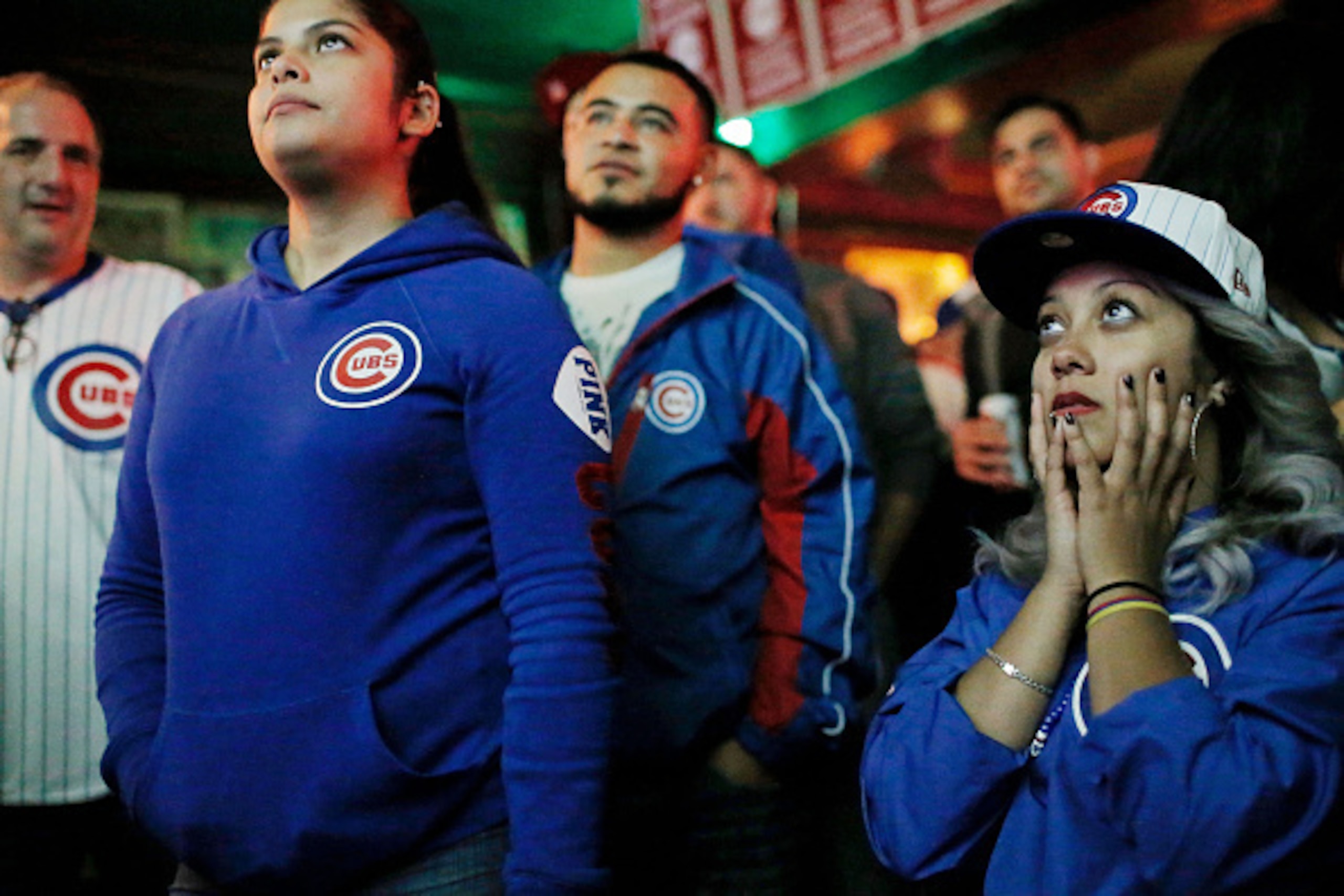 CHICAGO, IL - OCTOBER 07:  Ibanne Bandera of Des Plaines, Illinois waits for the game to resume after Jake Arrieta #49 of the Chicago Cubs (not pictured) was hit by a pitch and the benches cleared during the seventh inning of the National League Wild Card