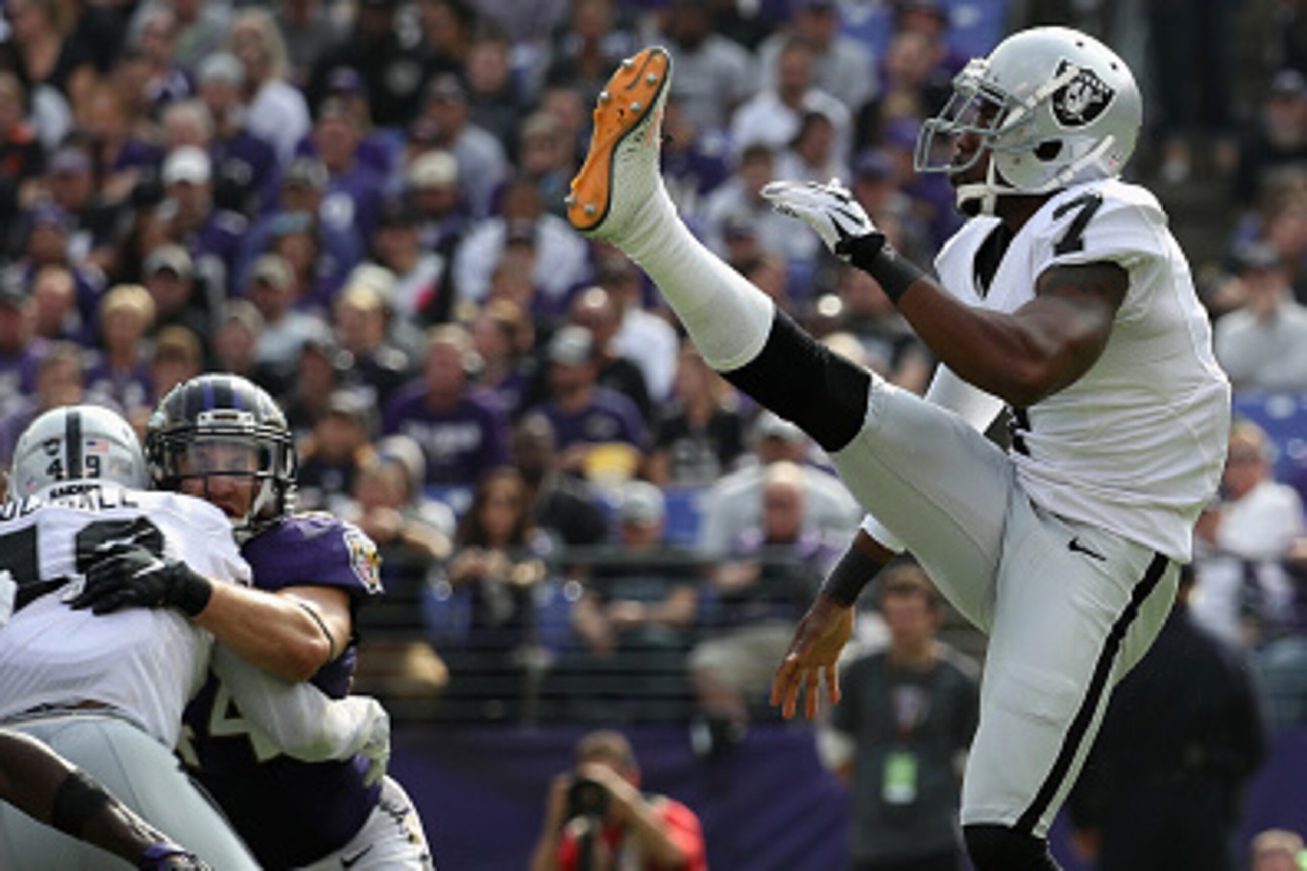 BALTIMORE, MD - OCTOBER 02: Punter  Marquette King #7 of the Oakland Raiders follows a punt against the Baltimore Ravens at M&T Bank Stadium on October 2, 2016 in Baltimore, Maryland.  (Photo by Rob Carr/Getty Images)
