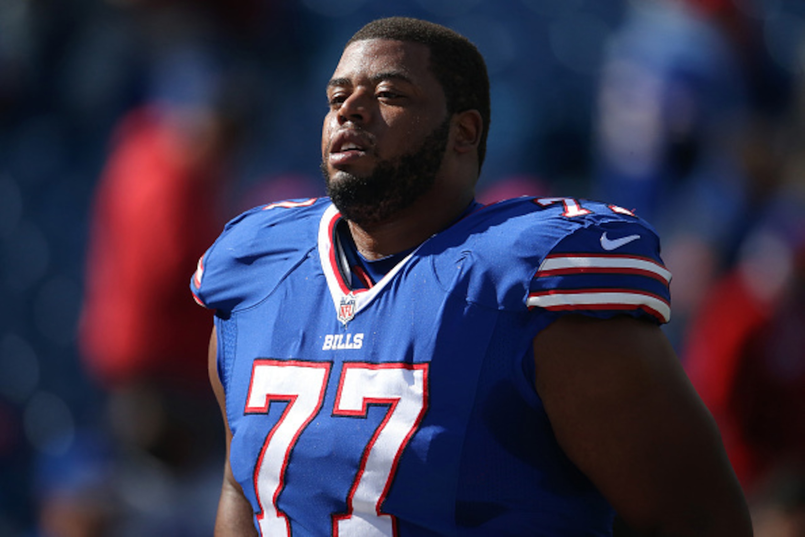 ORCHARD PARK, NY - OCTOBER 18: Cordy Glenn #77 of the Buffalo Bills as he warms up before playing against the Cincinnati Bengals during NFL game action at Ralph Wilson Stadium on October 18, 2015 in Orchard Park, New York. (Photo by Tom Szczerbowski/Getty