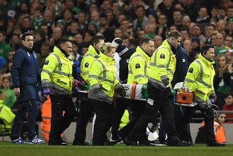 DUBLIN, IRELAND - OCTOBER 06: Medical staff take an injured Robbie Brady of Republic of Ireland off the pitch during the FIFA 2018 World Cup Group D Qualifier between Republic of Ireland and Georgia at Aviva Stadium on October 6, 2016 in Dublin, Ireland. 