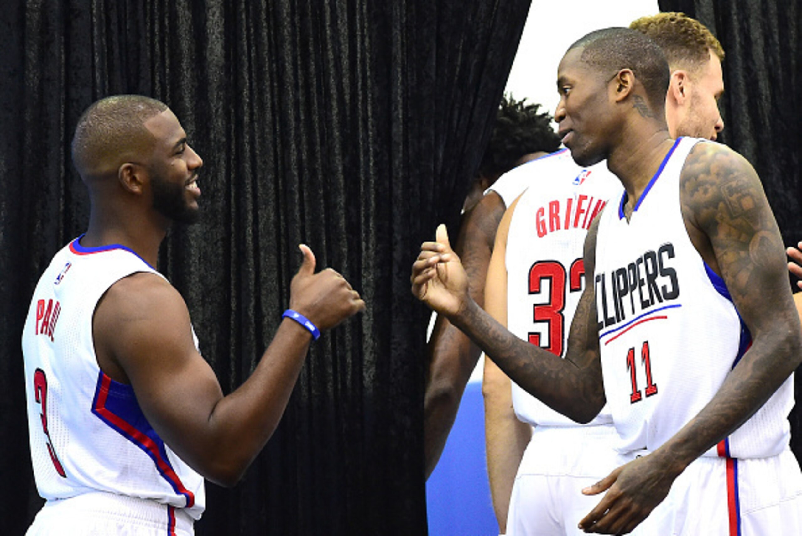 PLAYA VISTA, CA - SEPTEMBER 26: Chris Paul #3 and Jamal Crawford #11 of the Los Angeles Clippers exchange spots on the podium for interviews during media day at the Los Angeles Clippers Training Center on September 26, 2016 in Playa Vista, California. NO PLAYA VISTA, CA - SEPTEMBER 26: Chris Paul #3 and Jamal Crawford #11 of the Los Angeles Clippers exchange spots on the podium for interviews during media day at the Los Angeles Clippers Training Center on September 26, 2016 in Playa Vista, California. NO