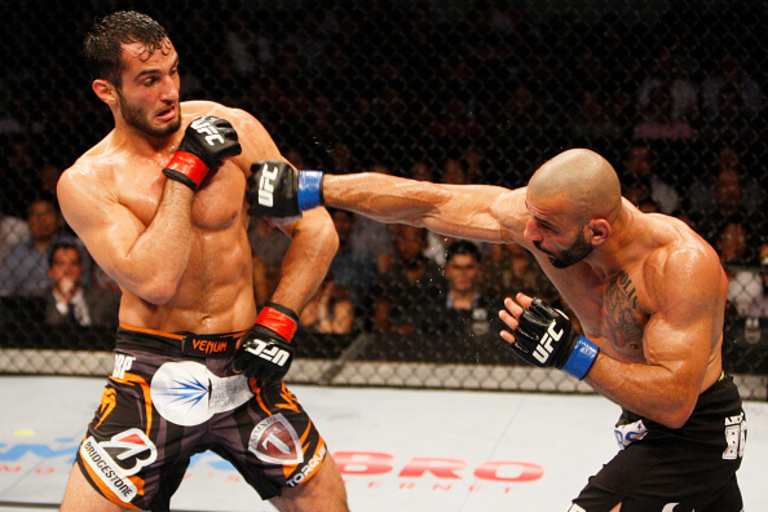 MANILA, PHILIPPINES - MAY 16:  Costas Philippou of the United States throws a punch at  Gegard Mousasi of the Netherlands in their middleweight fight during the UFC Fight Night event at the Mall of Asia Arena on May 16, 2015 in Manila, Philippines. (Photo
