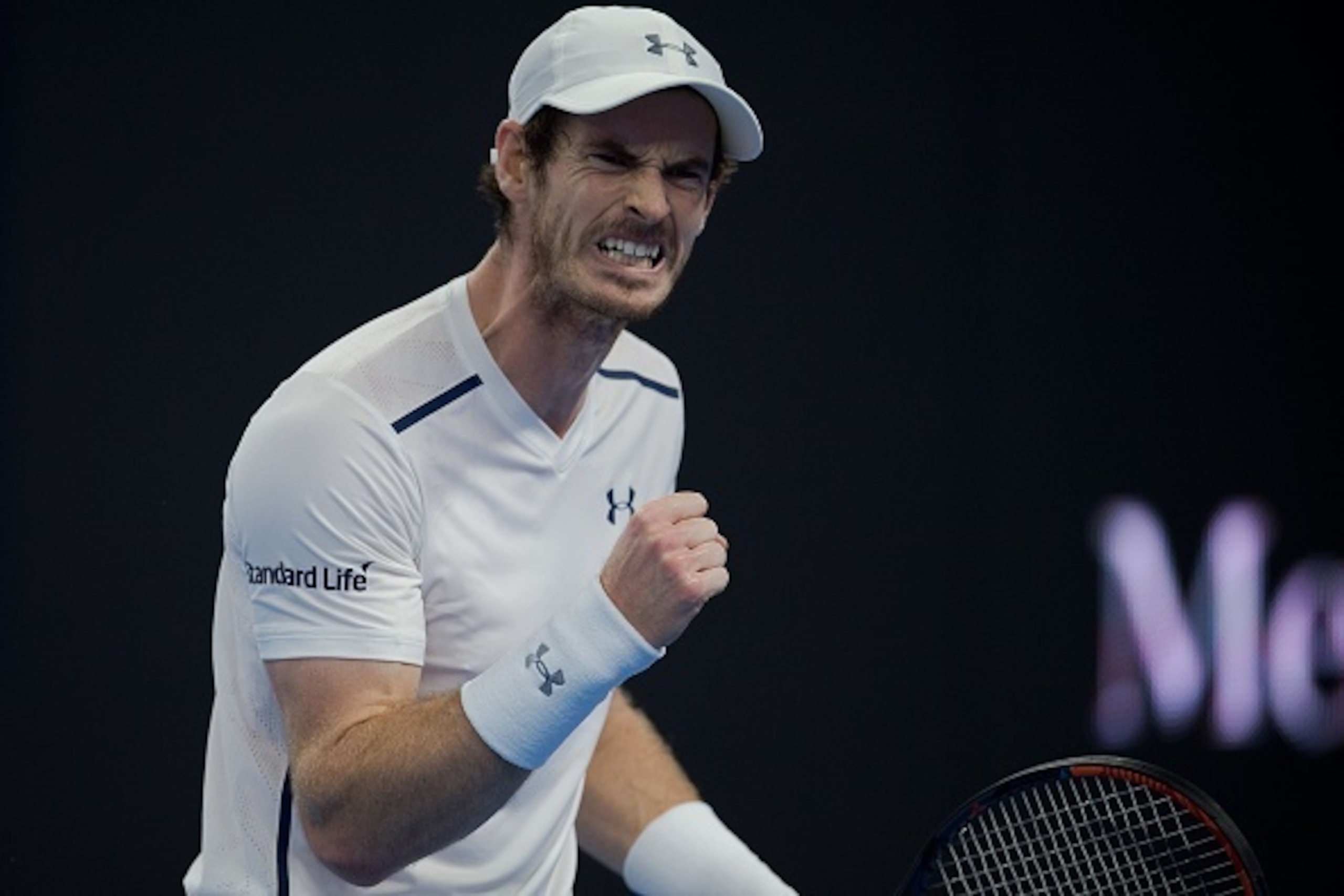 Andy Murray of Britain celebrates winning a point against Andrey Kuznetsov of Russia during the men's single second round of the China Open tennis tournament in Beijing on October 5, 2016. 
Murray won 6-2 6-1. / AFP / NICOLAS ASFOURI        (Photo credit 