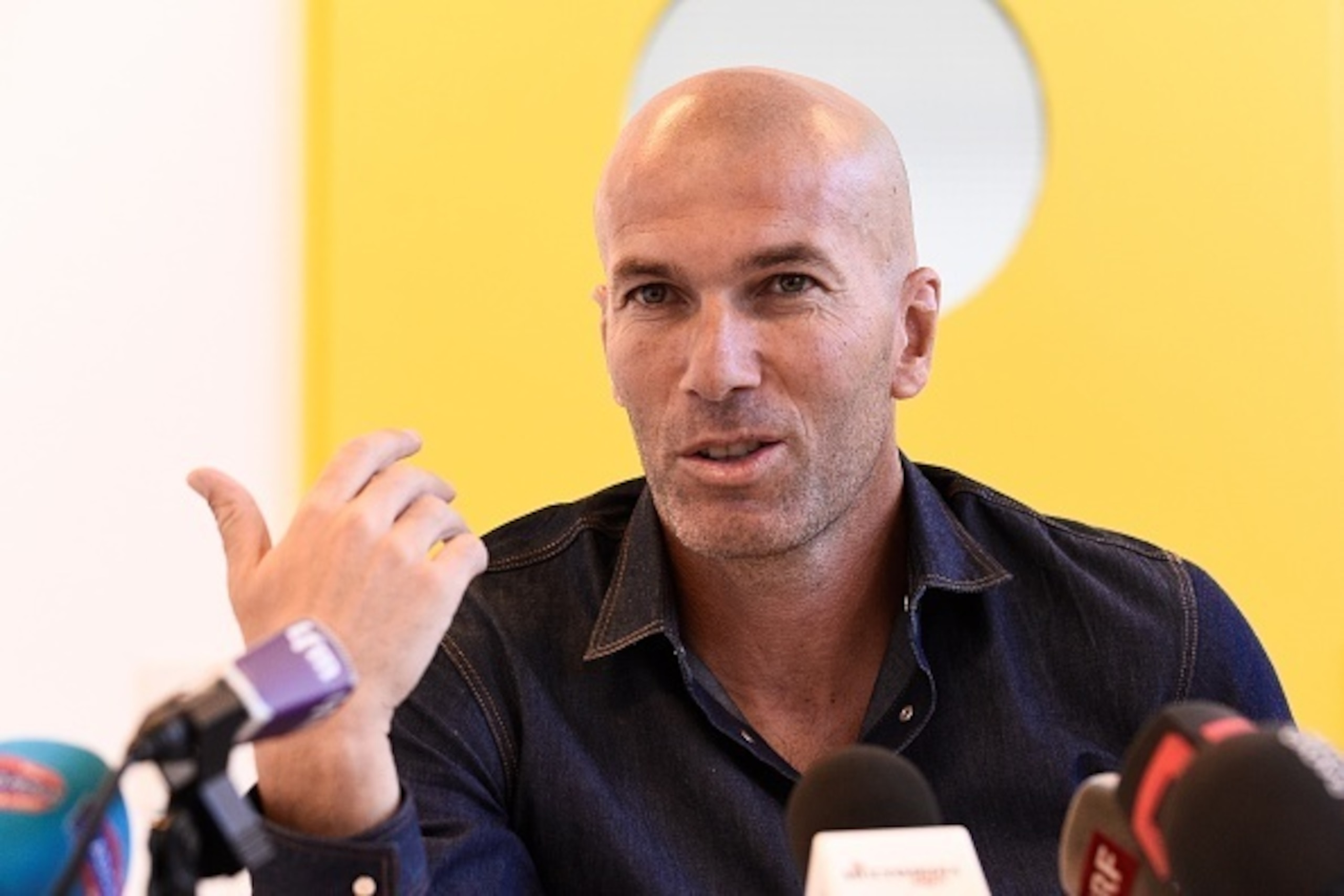 Real Madrid's head coach Zinedine Zidane gives a press conference, after leading a training session with young football hopefuls on October 3, 2016 in Lausanne.  / AFP / ALAIN GROSCLAUDE        (Photo credit should read ALAIN GROSCLAUDE/AFP/Getty Images)