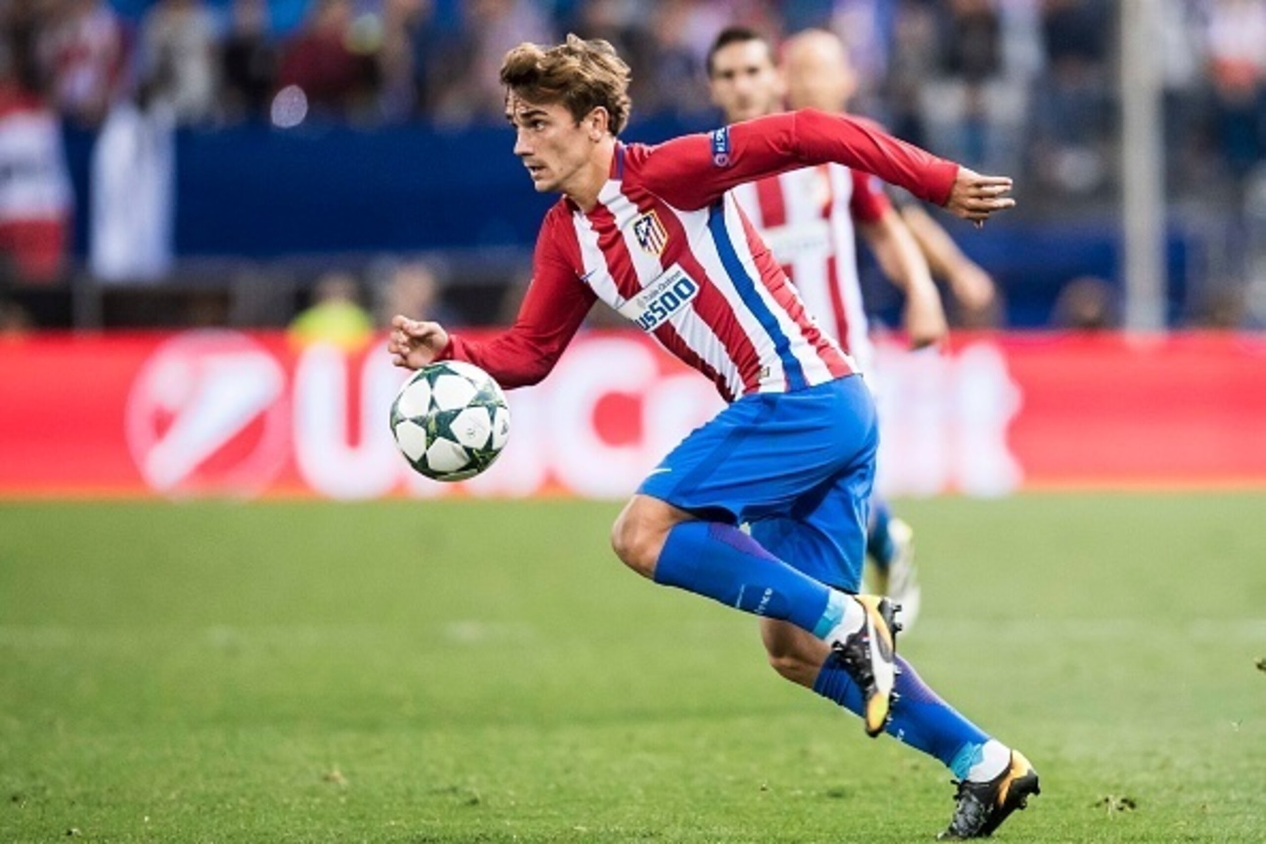 MADRID - SEPTEMBER 28: Antoine Griezmann of Atletico Madrid in action during their 2016-17 UEFA Champions League match between Atletico Madrid vs FC Bayern Munich at the Vicente Calderon Stadium on 28 September 2016 in Madrid, Spain. (Photo by Power Sport