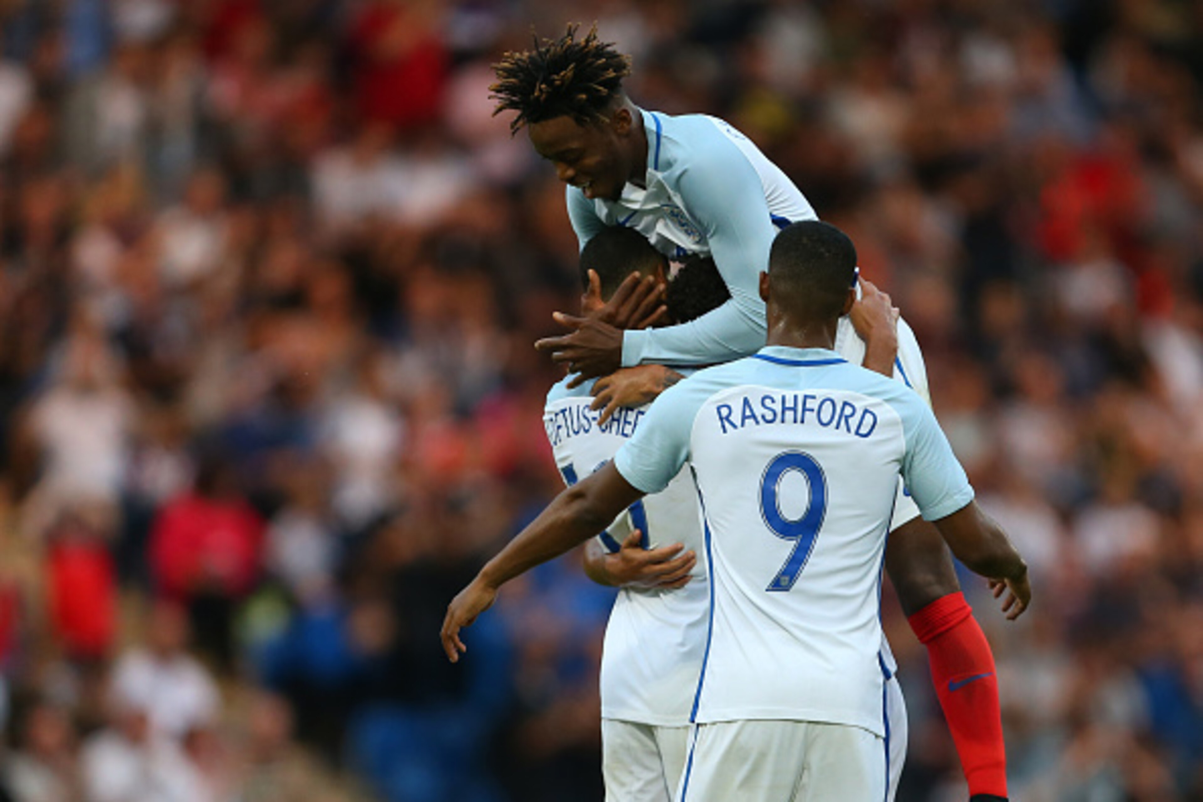 COLCHESTER, ENGLAND - SEPTEMBER 06: Nathaniel Chalobah and Marcus Rashford of England U21 congratulate Ruben Loftus-Cheek of England U21 during the UEFA European U21 Championship Qualifier Group 9 match between England U21 and Norway U21 at Colchester Com