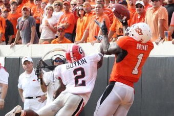 STILLWATER, OK - SEPTEMBER 5:  Runningback Brandon Boykin #2 of the Georgia Bulldogs dives for the ball for the ball as Dez Bryant #1 of the Oklahoma State Cowboys cannot make the pass during the third quarter of the game at Boone Pickens Stadium on Septe