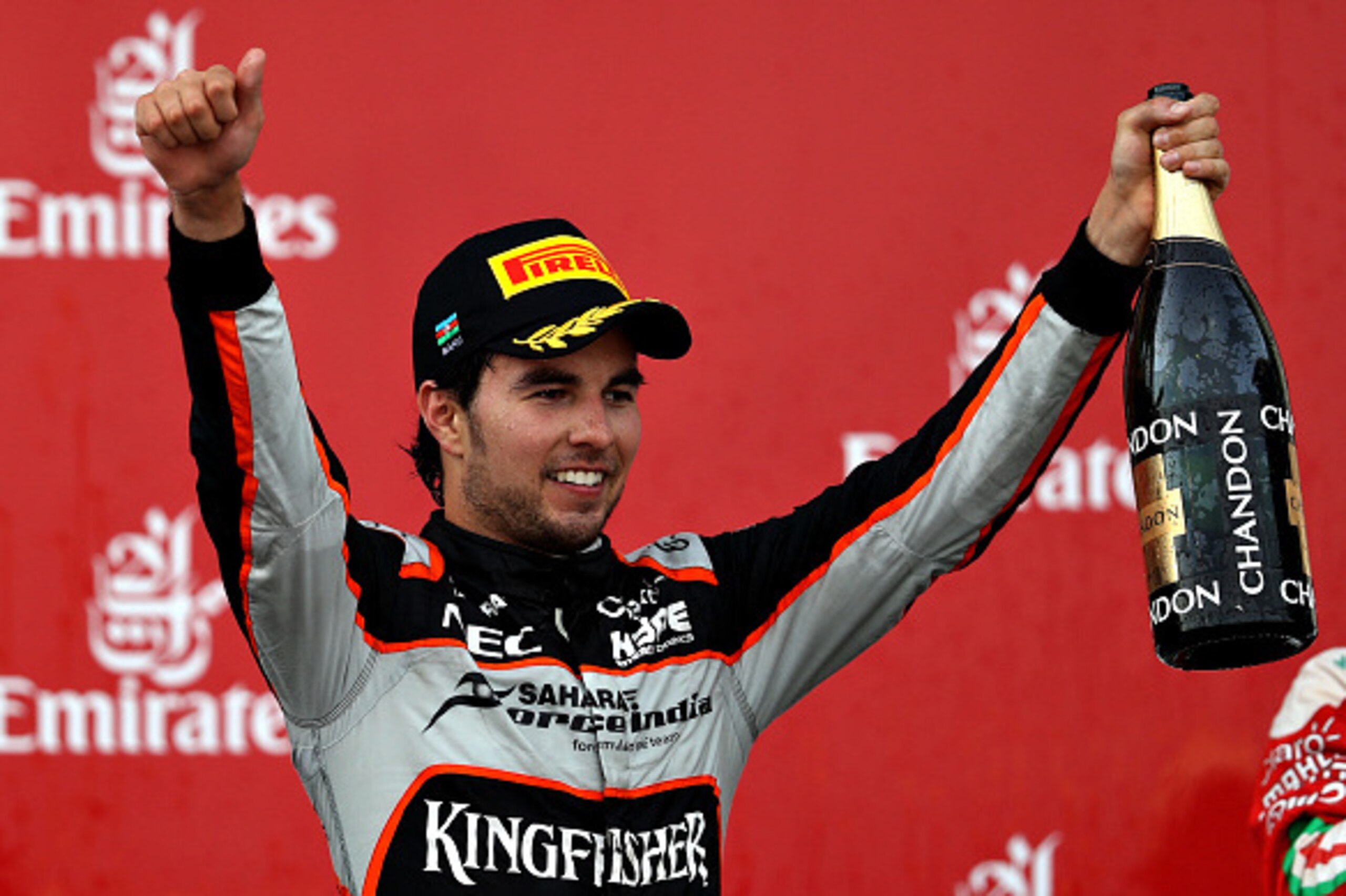 BAKU, AZERBAIJAN - JUNE 19: Sergio Perez of Mexico and Force India celebrates on the podium during the European Formula One Grand Prix at Baku City Circuit on June 19, 2016 in Baku, Azerbaijan.  (Photo by Mark Thompson/Getty Images)