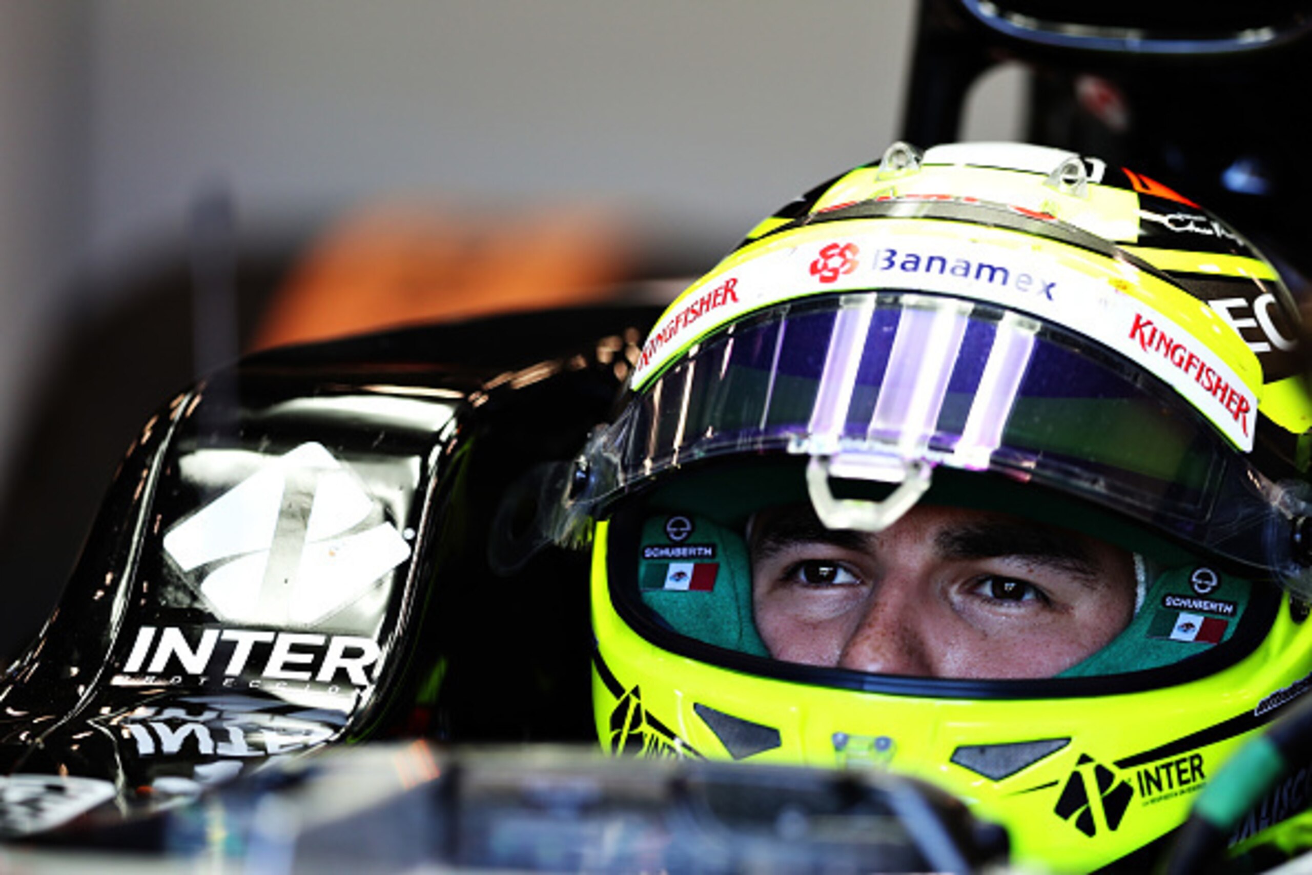 SPA, BELGIUM - AUGUST 26: Sergio Perez of Mexico and Force India sits in his car in the garage during practice for the Formula One Grand Prix of Belgium at Circuit de Spa-Francorchamps on August 26, 2016 in Spa, Belgium.  (Photo by Mark Thompson/Getty Ima