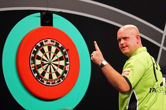 ROTTERDAM, NETHERLANDS - MAY 12:  Michael van Gerwen of the Netherlands celebrates a shot in his match against Phil 'The Power' Taylor of England during the Darts Betway Premier League Night 15 at Rotterdam Ahoy on May 12, 2016 in Rotterdam, .  (Photo by 