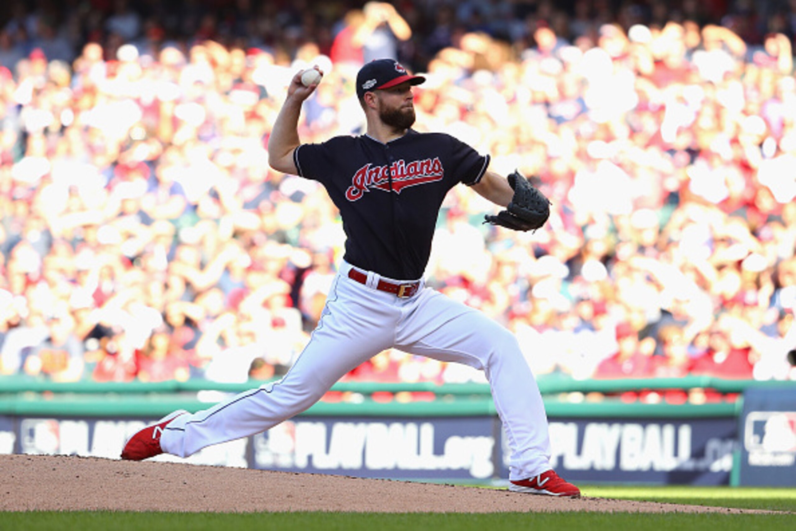CLEVELAND, OH - OCTOBER 07:  Corey Kluber #28 of the Cleveland Indians throws a pitch in the first inning against the Boston Red Sox during game two of the American League Divison Series at Progressive Field on October 7, 2016 in Cleveland, Ohio.  (Photo 