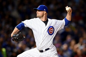 CHICAGO, ILLINOIS - OCTOBER 07:  Jon Lester #34 of the Chicago Cubs pitches in the first inning against the San Francisco Giants at Wrigley Field on October 7, 2016 in Chicago, Illinois.  (Photo by Stacy Revere/Getty Images)