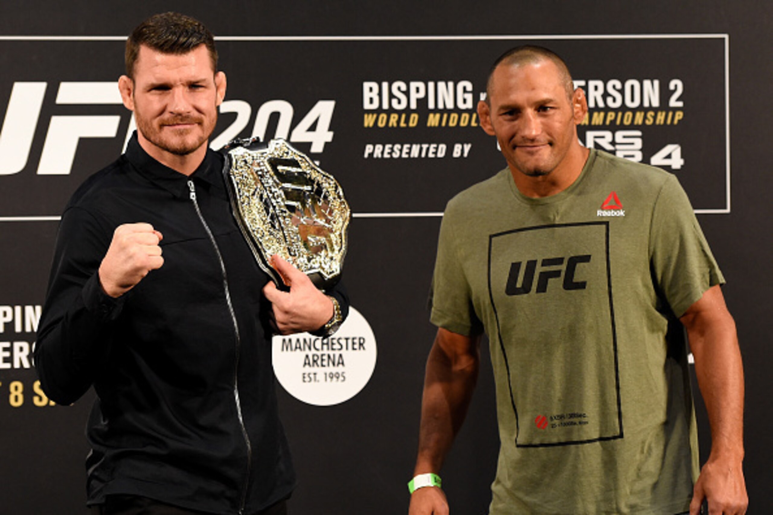 MANCHESTER, ENGLAND - OCTOBER 06: (L-R) Opponents Michael Bisping of England and Dan Henderson pose for photos during the UFC 204 Ultimate Media Day at Manchester Central on October 6, 2016 in Manchester, England. (Photo by Josh Hedges/Zuffa LLC/Zuffa L MANCHESTER, ENGLAND - OCTOBER 06: (L-R) Opponents Michael Bisping of England and Dan Henderson pose for photos during the UFC 204 Ultimate Media Day at Manchester Central on October 6, 2016 in Manchester, England. (Photo by Josh Hedges/Zuffa LLC/Zuffa L