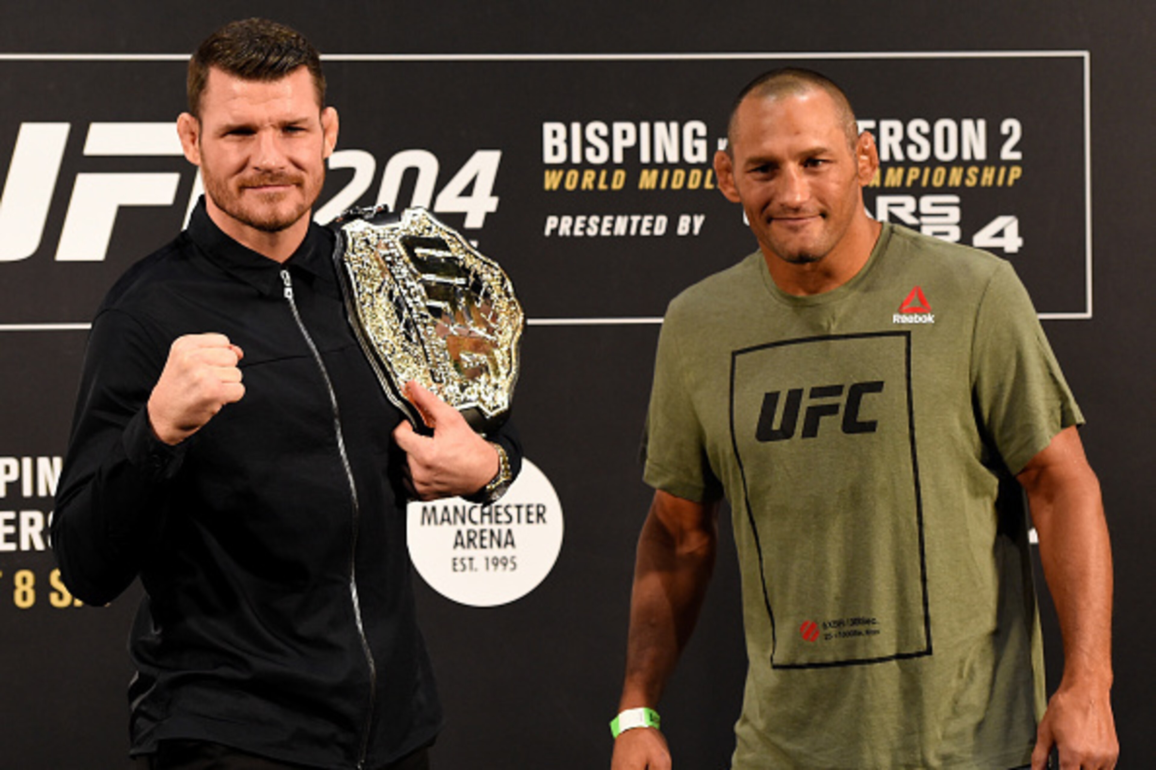 MANCHESTER, ENGLAND - OCTOBER 06: (L-R) Opponents Michael Bisping of England and Dan Henderson pose for photos during the UFC 204 Ultimate Media Day at Manchester Central on October 6, 2016 in Manchester, England. (Photo by Josh Hedges/Zuffa LLC/Zuffa L MANCHESTER, ENGLAND - OCTOBER 06: (L-R) Opponents Michael Bisping of England and Dan Henderson pose for photos during the UFC 204 Ultimate Media Day at Manchester Central on October 6, 2016 in Manchester, England. (Photo by Josh Hedges/Zuffa LLC/Zuffa L