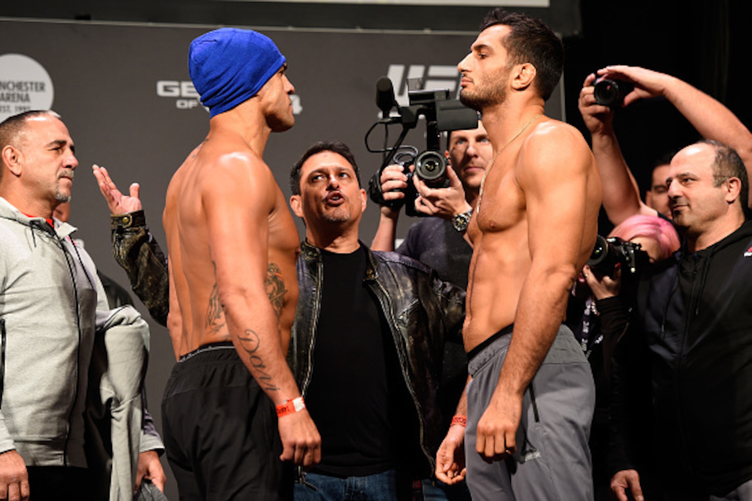 MANCHESTER, ENGLAND - OCTOBER 07:  (L-R) Vitor Belfort of Brazil and Gegard Mousasi of the Netherlands face-off during the UFC 204 weigh-in at the Manchester Central Convention Complex on October 7, 2016 in Manchester, England. (Photo by Josh Hedges/Zuffa
