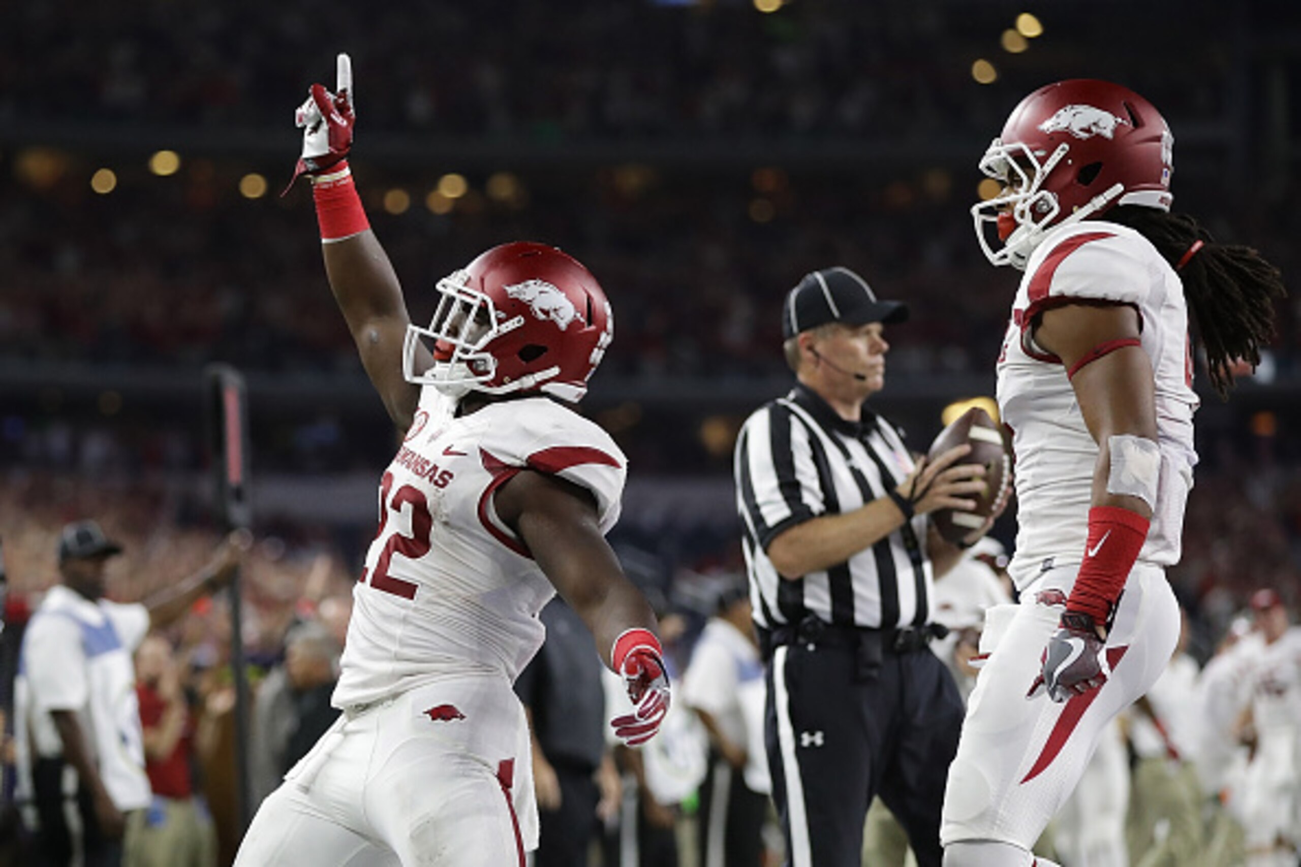 ARLINGTON, TX - SEPTEMBER 24:  Rawleigh Williams III #22 of the Arkansas Razorbacks celebrates his touchdown run against the Texas A&M Aggies in the second quarter at AT&T Stadium on September 24, 2016 in Arlington, Texas.  (Photo by Ronald Martinez/Getty