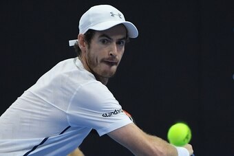 Andy Murray of Britain hits a return against Britain's Kyle Edmund during their men's singles quater-final match at the China Open tennis tournament in Beijing on October 7, 2016. / AFP / WANG ZHAO        (Photo credit should read WANG ZHAO/AFP/Getty Imag
