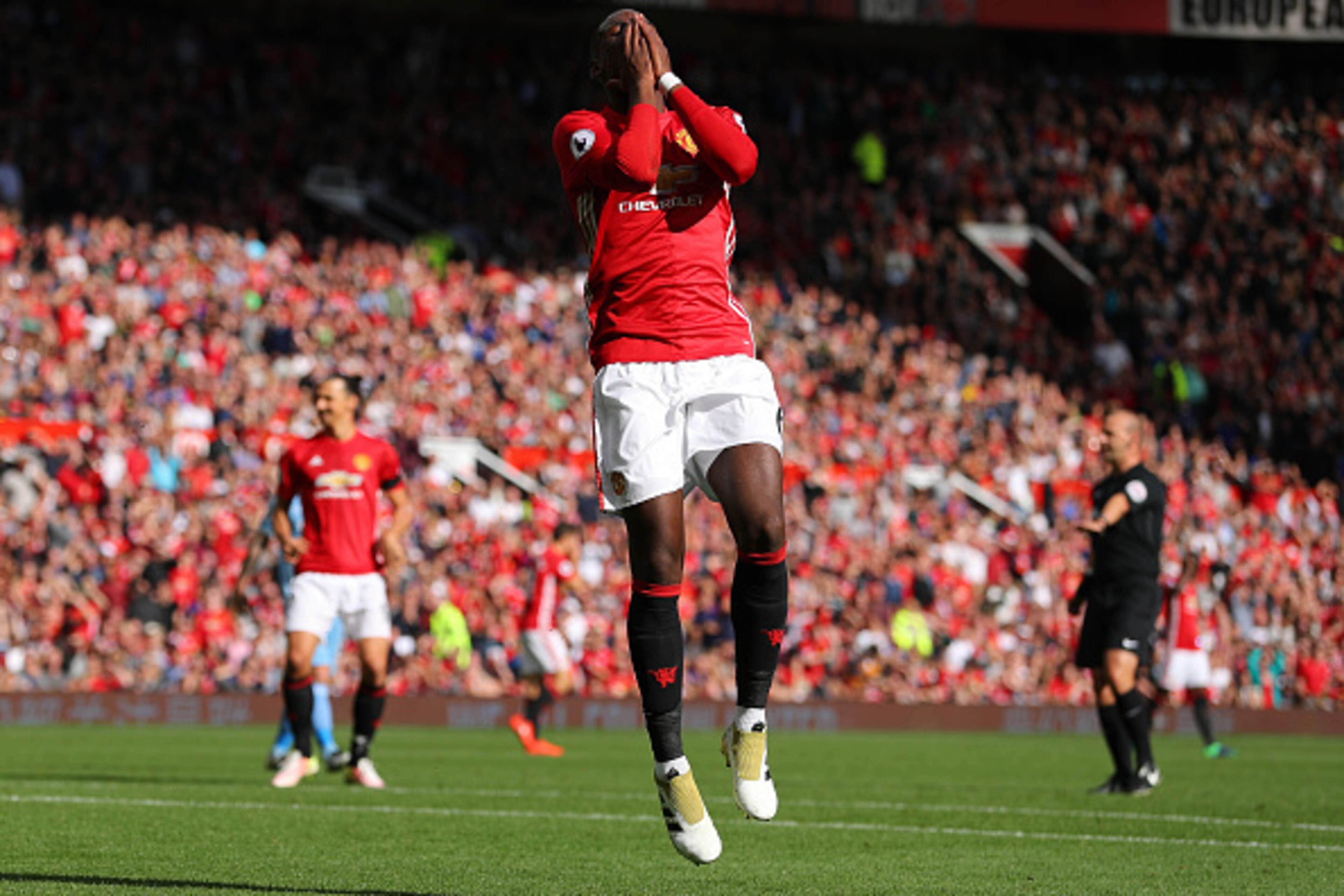 MANCHESTER, ENGLAND - OCTOBER 02:  Paul Pogba of Manchester United reacts to shooting wide of the goal during the Premier League match between Manchester United and Stoke City at Old Trafford on October 2, 2016 in Manchester, England.  (Photo by Richard H