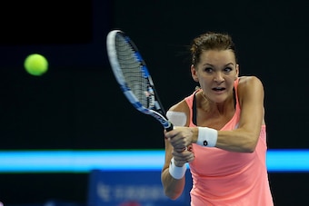BEIJING, CHINA - OCTOBER 07:  Agnieszka Radwanska of Poland returns a shot against Yaroslava Shvedova of Kazakhstan during the Women's singles Quarterfinals on day seven of the 2016 China Open at the China National Tennis Centre on October 7, 2016 in Beij