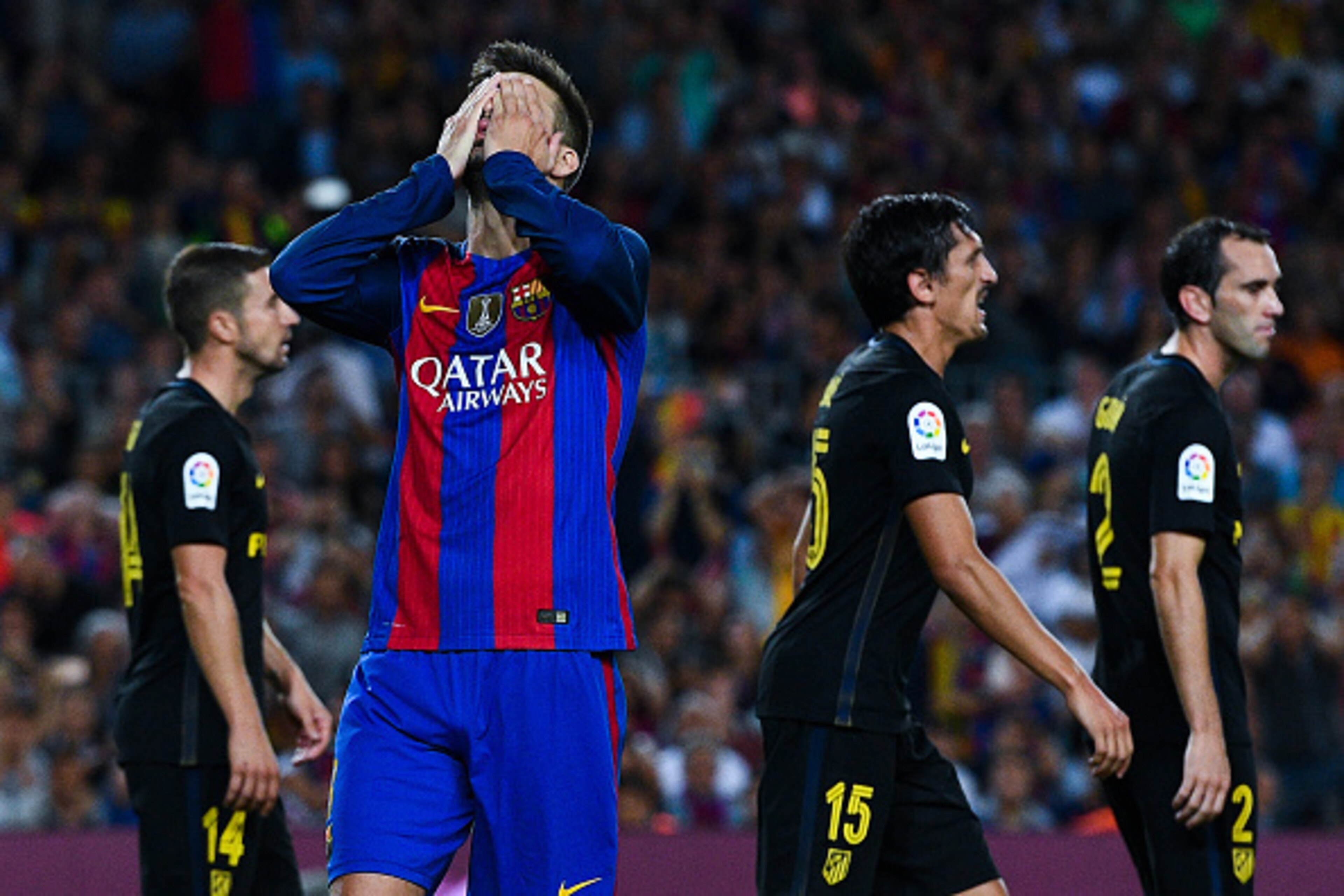 BARCELONA, SPAIN - SEPTEMBER 21:  Gerard Pique of FC Barcelona reacts after missing a chance to score during the La Liga match between FC Barcelona and Club Atletico de Madrid at the Camp Nou stadium on September 21, 2016 in Barcelona, Spain.  (Photo by D