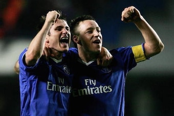 LONDON - MARCH 8:  Frank Lampard and John Terry of Chelsea celebrate victory at the end of the UEFA Champions League, First Knockout Round, Second Leg match between Chelsea and Barcelona at Stamford Bridge on March 8, 2005 in London, England.  (Photo by S