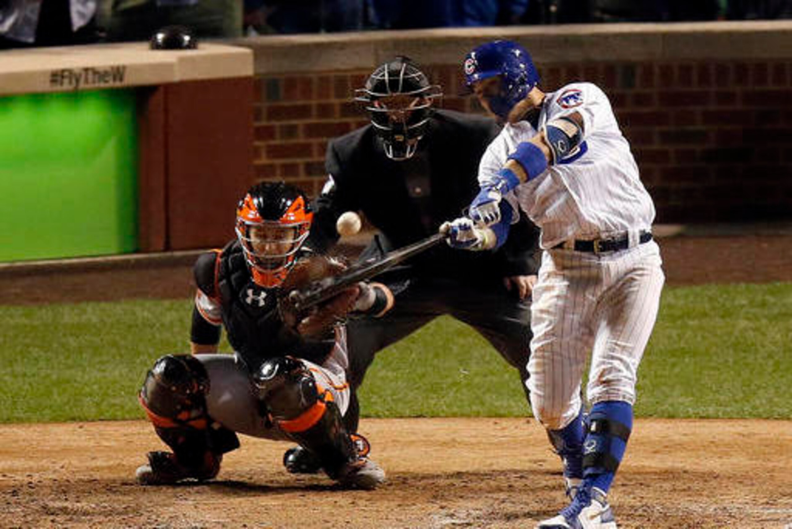 Javier Baez homered in Game 1 to give the Cubs a 1-0 victory against the Giants.