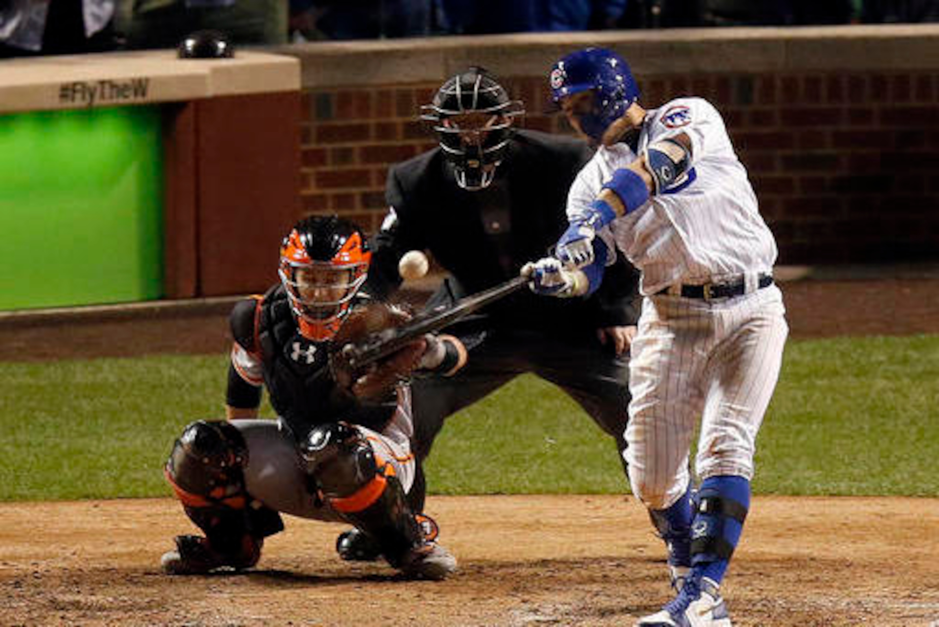 Javier Baez homered in Game 1 to give the Cubs a 1-0 victory against the Giants.