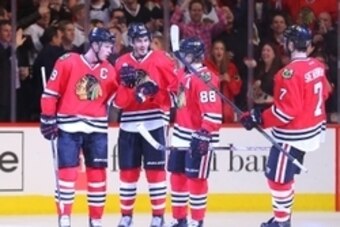 Apr 7, 2016; Chicago, IL, USA; Chicago Blackhawks center Jonathan Toews (19) celebrates with teammates after scoring a goal during the second period against the St. Louis Blues at the United Center. Mandatory Credit: Dennis Wierzbicki-USA TODAY Sports