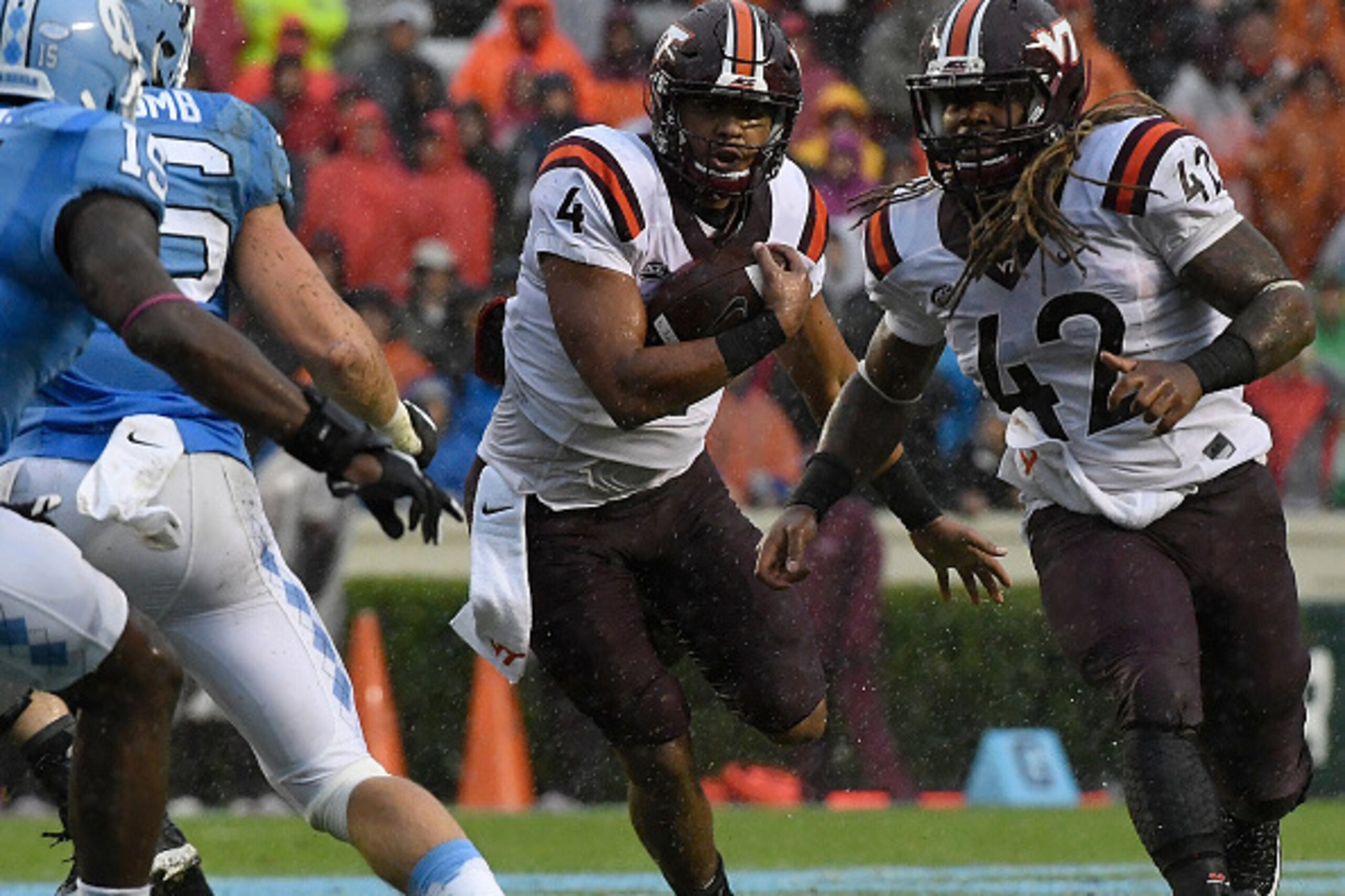 CHAPEL HILL, NC - OCTOBER 08: Jerod Evans #4 of the Virginia Tech Hokies runs against the UNC Tar Heels at Kenan Stadium on October 8, 2016 in Chapel Hill, North Carolina. (Photo by Mike Comer/Getty Images) CHAPEL HILL, NC - OCTOBER 08: Jerod Evans #4 of the Virginia Tech Hokies runs against the UNC Tar Heels at Kenan Stadium on October 8, 2016 in Chapel Hill, North Carolina. (Photo by Mike Comer/Getty Images)