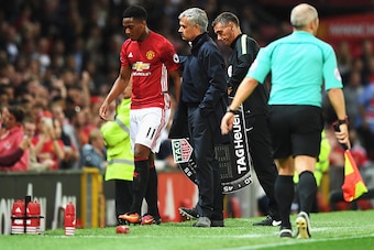 MANCHESTER, ENGLAND - AUGUST 19:  Anthony Martial of Manchester United is substituted by Jose Mourinho, Manager of Manchester United during the Premier League match between Manchester United and Southampton at Old Trafford on August 19, 2016 in Manchester