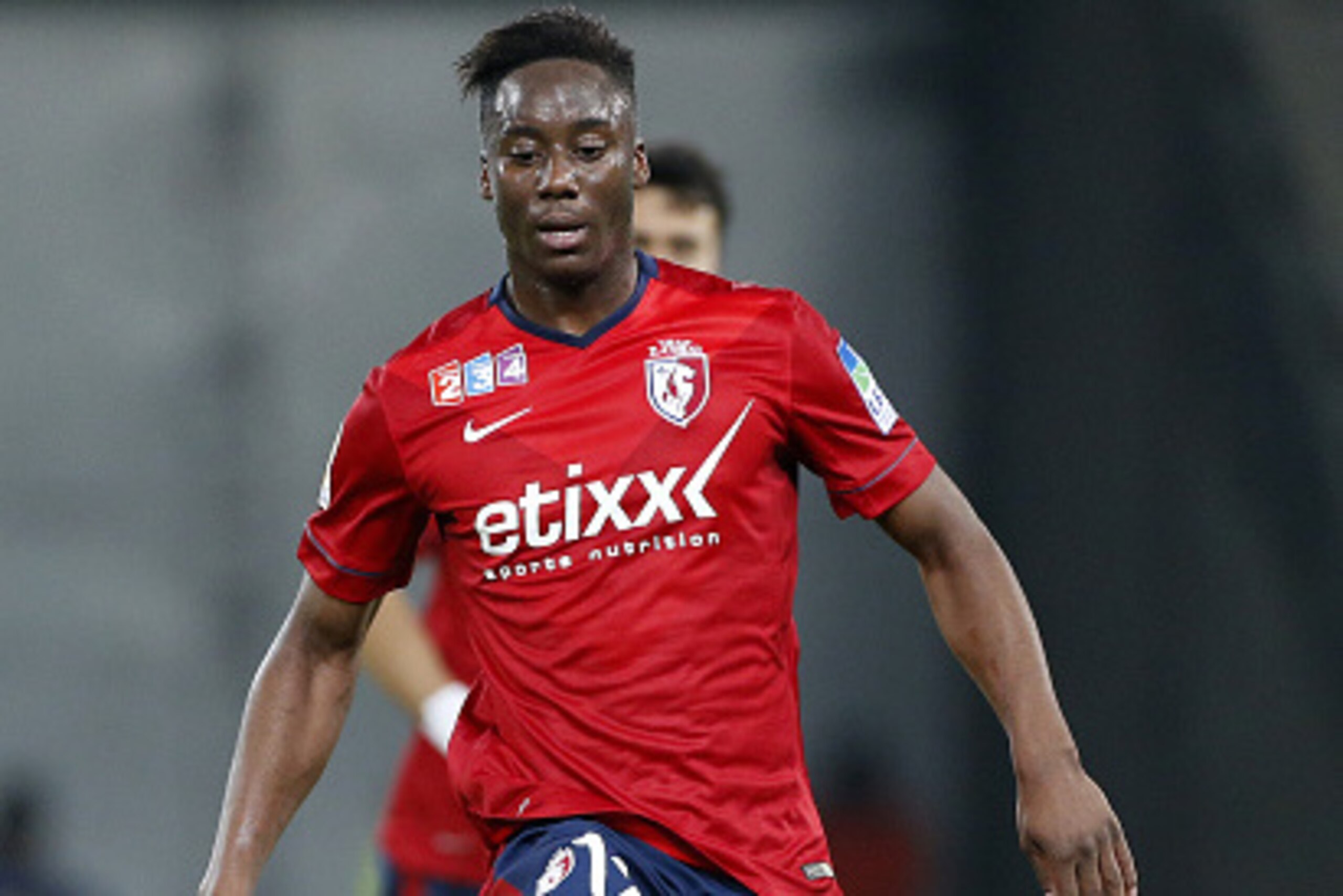 LILLE, FRANCE - DECEMBER 17: Soualiho Meite of Lille in action during the French League Cup (Coupe de la ligue) match between Lille OSC and Girondins de Bordeaux at Grand Stade Pierre Mauroy stadium on December 17, 2014 in Lille, France. (Photo by Jean Ca