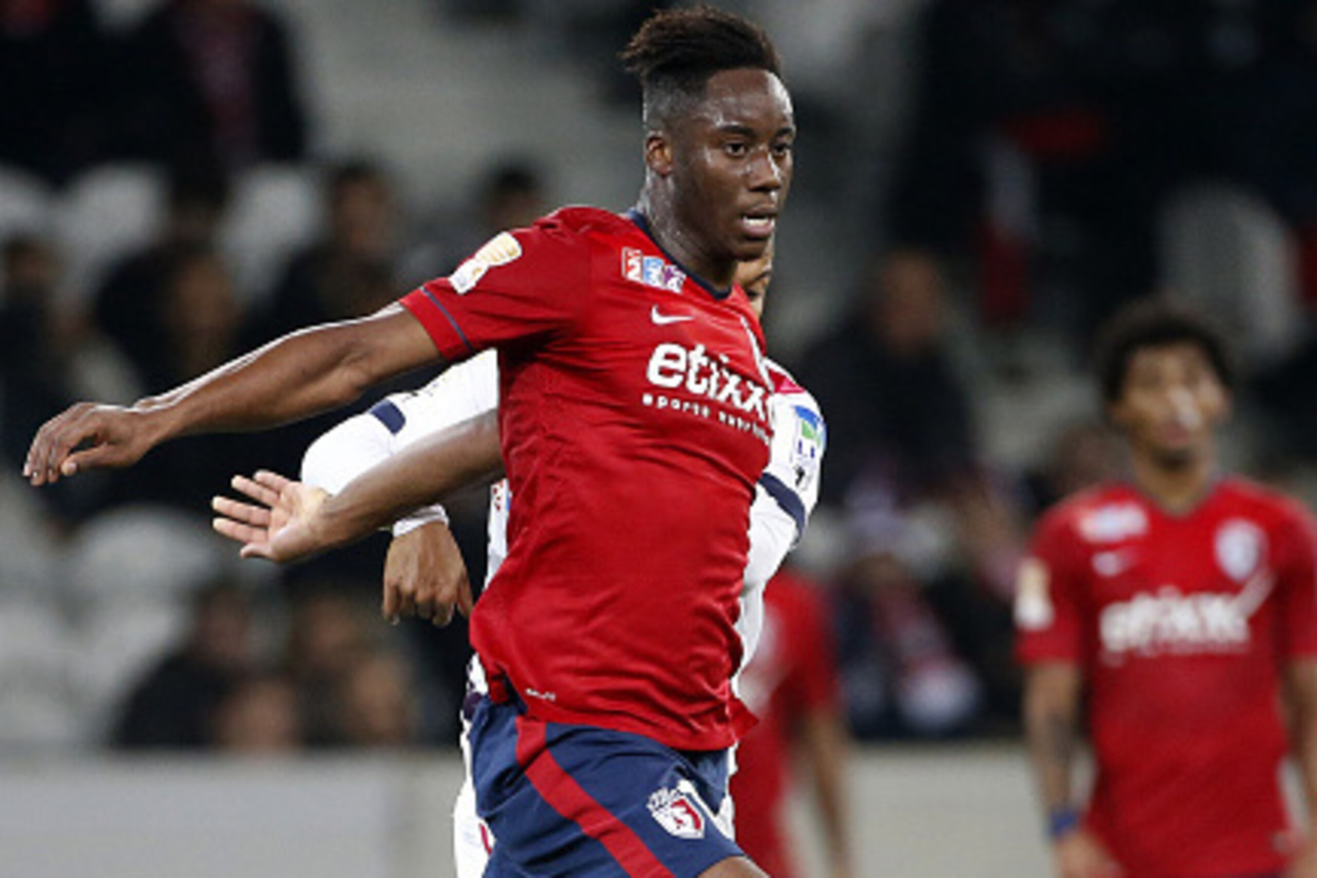 LILLE, FRANCE - DECEMBER 17: Soualiho Meite of Lille in action during the French League Cup (Coupe de la ligue) match between Lille OSC and Girondins de Bordeaux at Grand Stade Pierre Mauroy stadium on December 17, 2014 in Lille, France. (Photo by Jean Ca