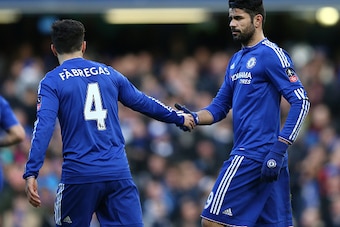 Chelsea's Brazilian-born Spanish striker Diego Costa (R) celebrates with Chelsea's Spanish midfielder Cesc Fabregas after scoring his team's first goal during the FA Cup third-round football match between Chelsea and Scunthorpe United at Stamford Bridge i
