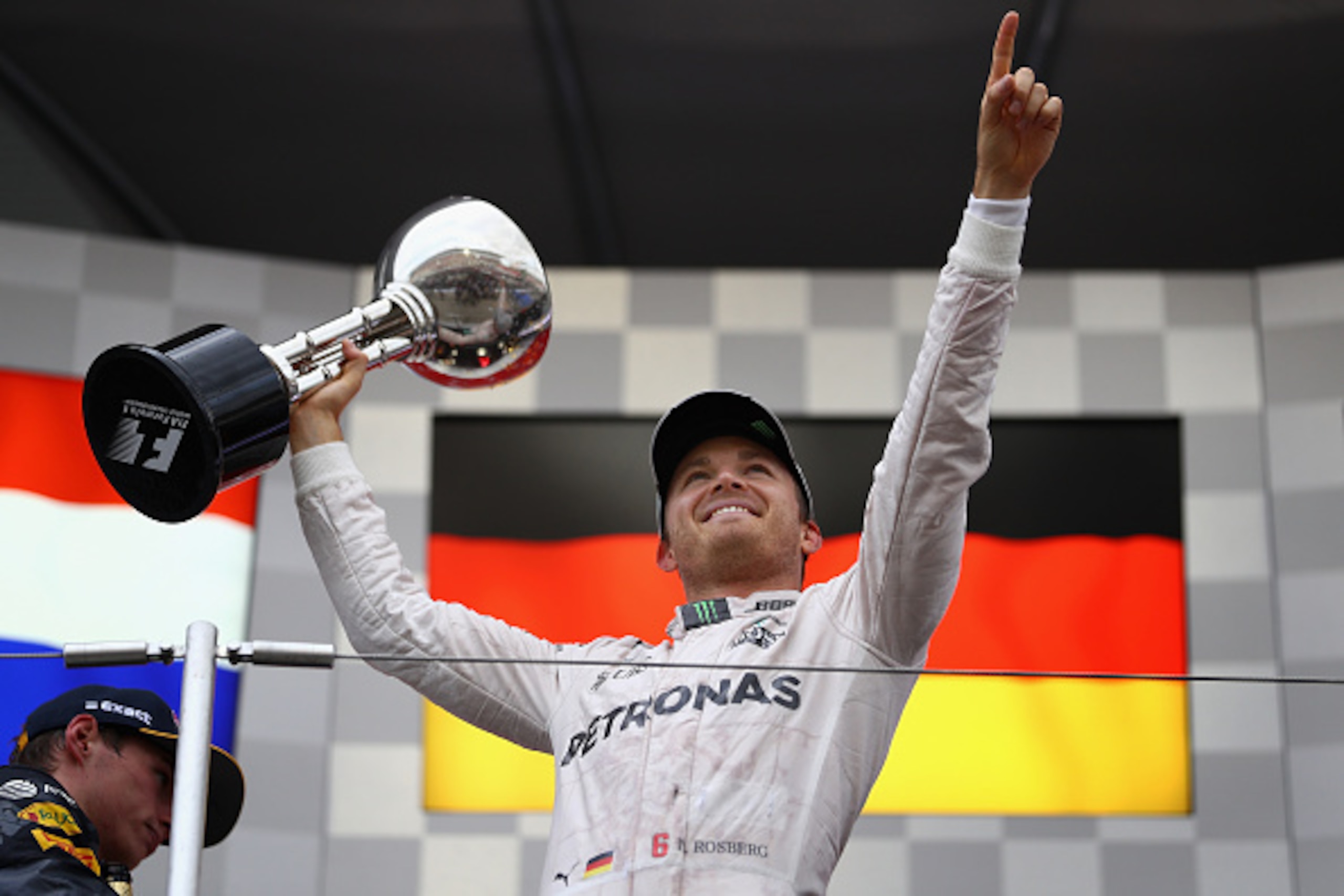 SUZUKA, JAPAN - OCTOBER 09:  Nico Rosberg of Germany and Mercedes GP celebrates his win on the podium during the Formula One Grand Prix of Japan at Suzuka Circuit on October 9, 2016 in Suzuka.  (Photo by Clive Mason/Getty Images)
