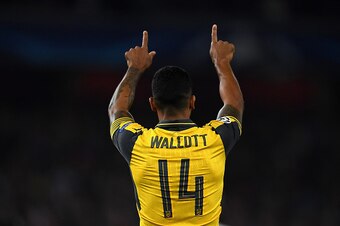 LONDON, ENGLAND - SEPTEMBER 28:  Theo Walcott of Arsenal ceclebrates after scoring the opening goal during the UEFA Champions League group A match between Arsenal FC and FC Basel 1893 at the Emirates Stadium on September 28, 2016 in London, England.  (Pho