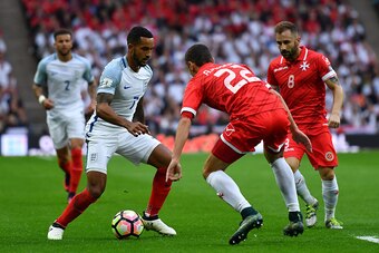 LONDON, ENGLAND - OCTOBER 08: Theo Walcott of England takes on Alex Muscat of Malta during the FIFA 2018 World Cup Qualifier Group F match between England and Malta at Wembley Stadium on October 8, 2016 in London, England.  (Photo by Mike Hewitt/Getty Ima