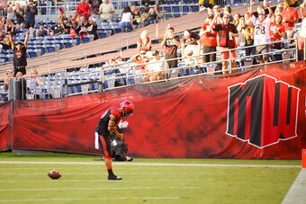 SAN DIEGO, CA - SEPTEMBER 03: Donnel Pumphrey #19 of the San Diego State Aztecs celebrates with Rashaad Penny #20 after scoring a touchdown in the 1st half against the New Hampshire Wildcats at Qualcomm Stadium on September 3, 2016 in San Diego, Californi